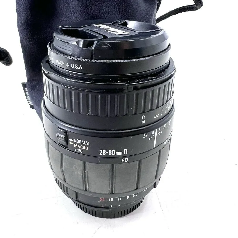 Sigma 28-80f/3.5-5.6 Aspherical Macro Lens w/a Tiffen Sky 1A Filter & Carry Bag
